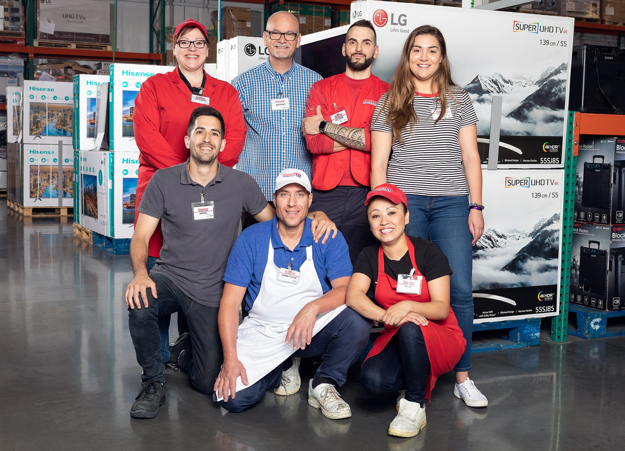 Fotografía de cultura de empresa — equipo de empleados de Costco en almacén